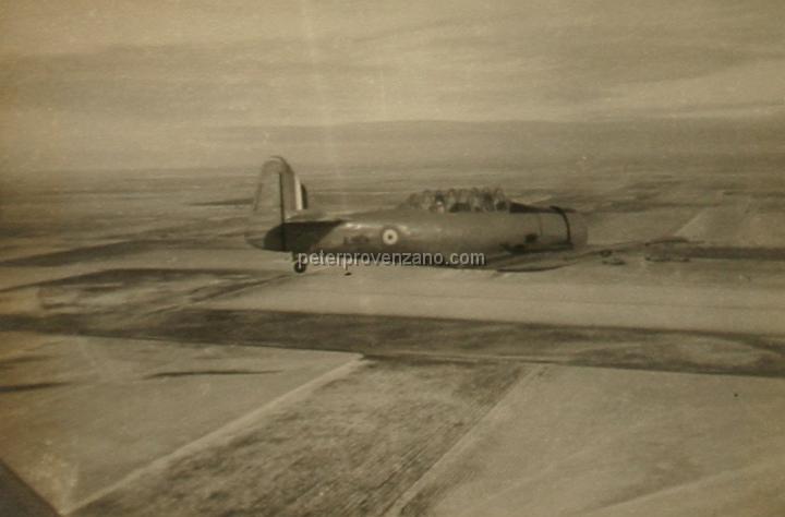 Peter Provenzano Photo Album Image_copy_131.jpg - Royal Canadian Air Force (RCAF), North American Harvard IIB (AT-6A) trainers over Saskatchewan Canada, 1942.
